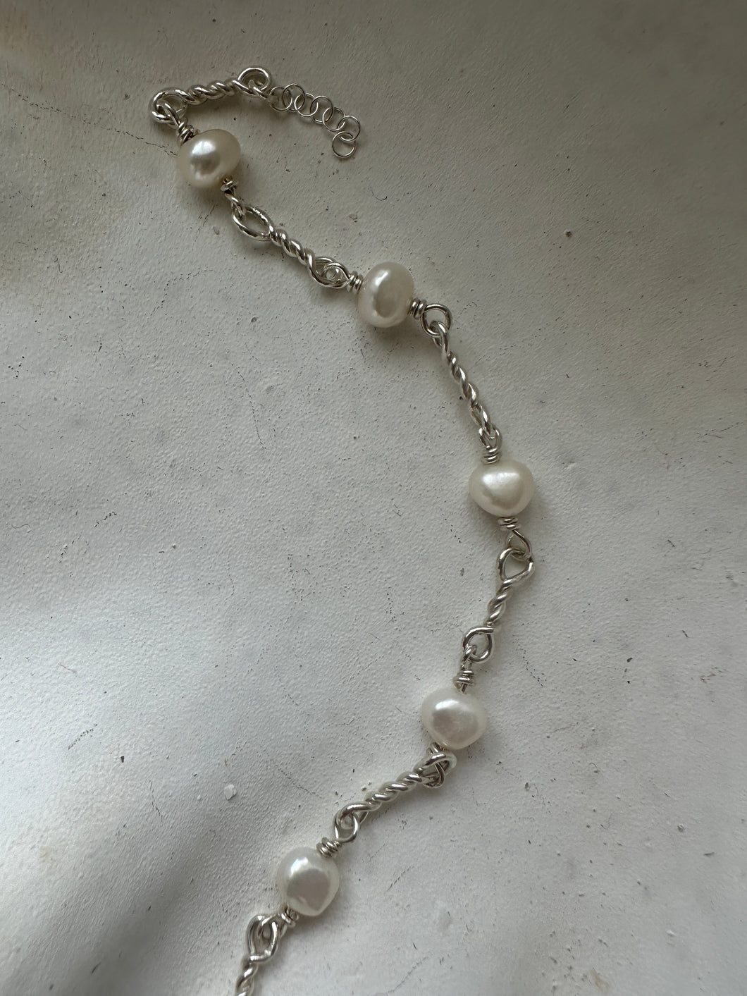 In A Twist Pearl Bracelet